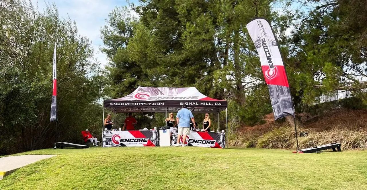 Event booth for Encore Supply at a golf course in Signal Hill, CA.